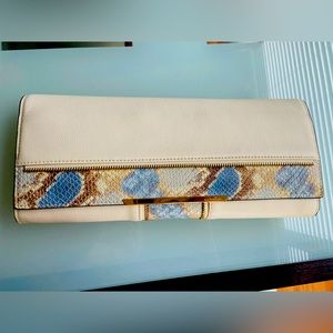 Vince Camuto leather clutch in beige/cream and blue with gold hardware.